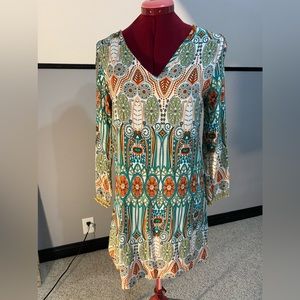 Retro mini dress with fun patterns and Pom poms on sleeves and back of neck